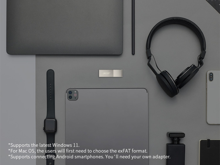 فلش مموری ایسر مدل UF300 USB 3.2 ظرفیت 32 گیگابایت کنار وسایل